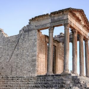 Stunning view of ancient Roman temple ruins showcasing classic architecture in Tunisia.